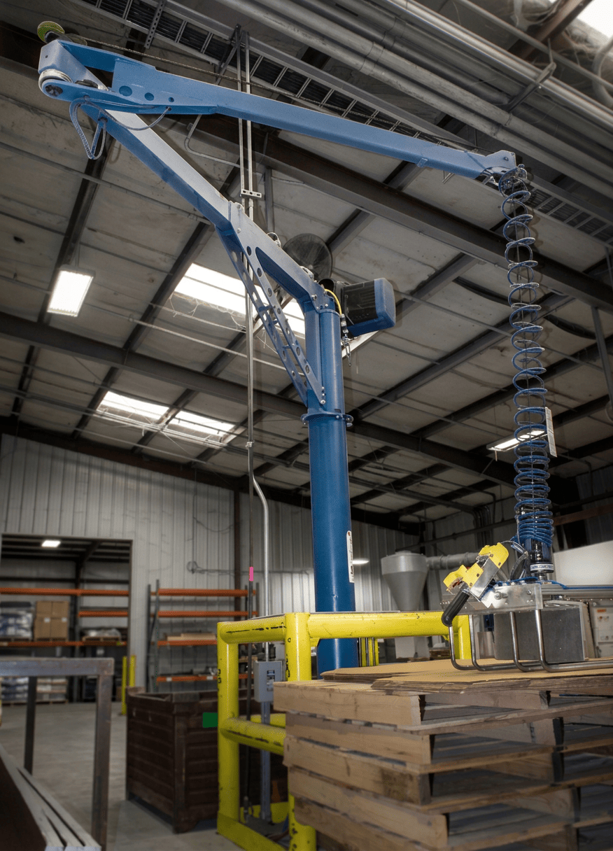 Articulating arm manipulator handling industrial components